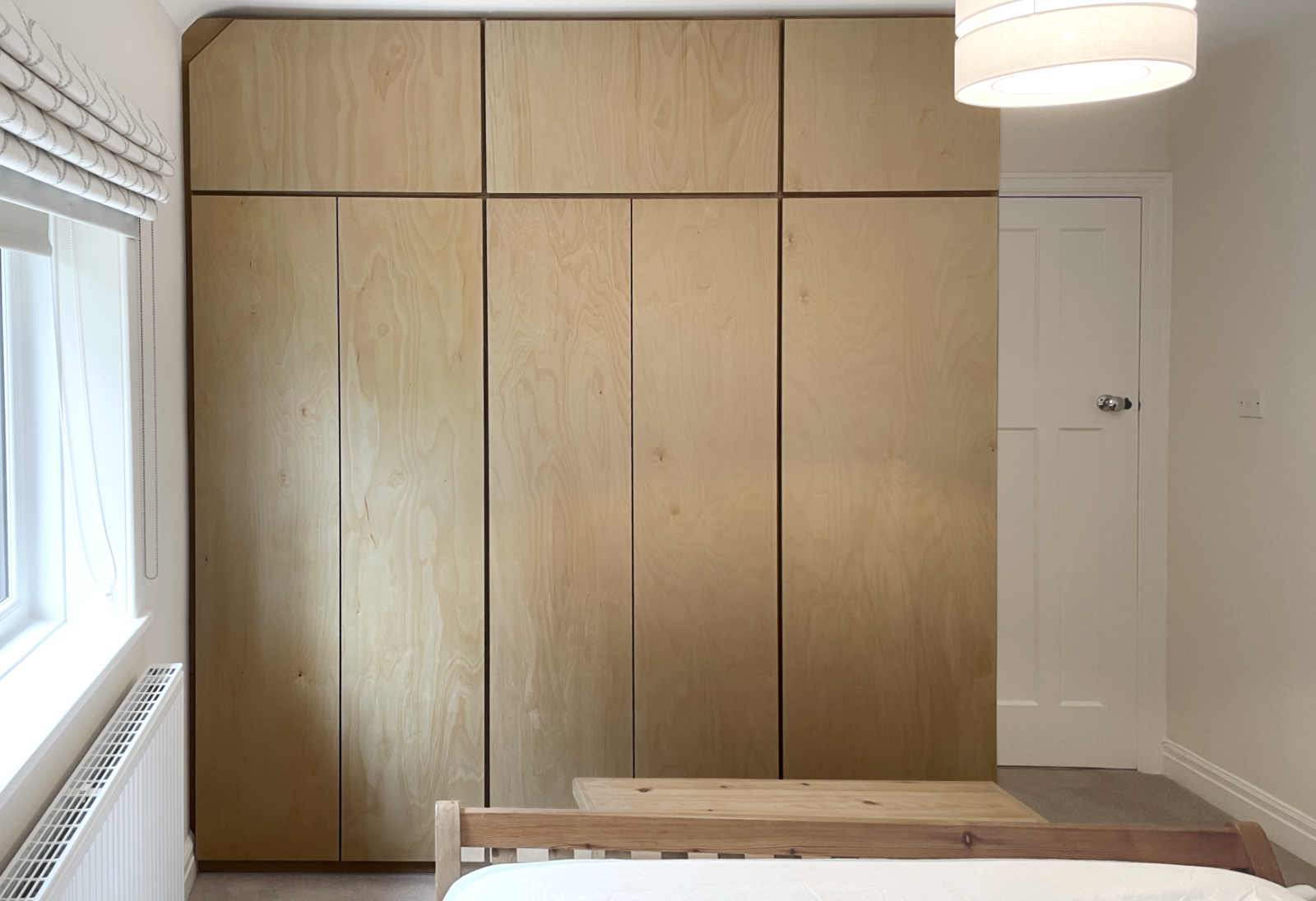 Contemporary Birch plywood wardrobes in an oil and wax finish